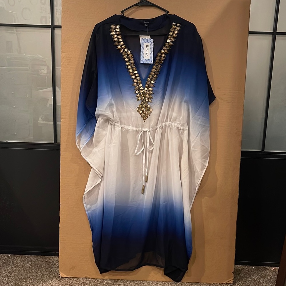Black blue and white long dress with a gold accent